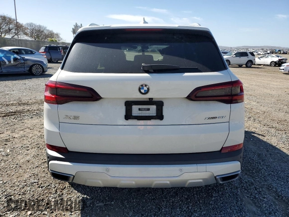 2020 BMW X5 xDrive40i with VIN 5UXCR6C02L9C46986, listed as a Copart auction lot 49099615 with Not provided miles and Salvage title. Bid and sale history available at DreamBid. Image 6.
