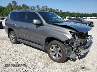 2012 Lexus GX 460 Premium with VIN JTJJM7FX4C5038096, listed as a Copart auction lot 50147065 with 128,954 mi miles and Salvage title. Bid and sale history available at DreamBid. Image 4.