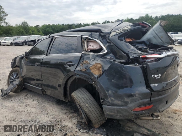2023 Mazda CX-9 Touring z VIN JM3TCBCY5P0647237, wystawiony jako Copart lot #56338625 z przebiegiem Nie podano mil oraz Szkoda całkowita • Salvage title. Historia ofert i sprzedaży dostępna na DreamBid. Obrazek 2.