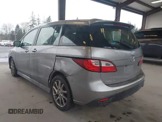 2012 Mazda Mazda5 Grand Touring with VIN JM1CW2DL7C0143303, listed as a IAAI auction lot 41924227 with 126,689 mi miles. Bid and sale history available at carsss.com. Image 3.