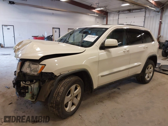 2011 Jeep Grand Cherokee 70th Anniversary with VIN 1J4RR4GG4BC702759, listed as a IAAI auction lot 41871604 with 143,583 mi miles. Bid and sale history available at carsss.com. Image 17.