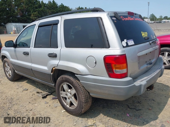 2003 Jeep Grand Cherokee Laredo with VIN 1J4GW48S83C558962, listed as a IAAI auction lot 42415803 with 312,419 mi miles and . Bid and sale history available at DreamBid. Image 3.