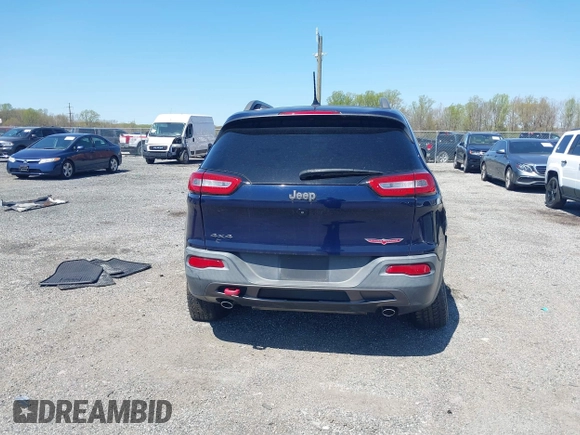 2015 Jeep Cherokee Trailhawk z VIN 1C4PJMBS3FW520829, wystawiony jako IAAI lot #42065548 z przebiegiem 90 534 mil mil oraz . Historia ofert i sprzedaży dostępna na DreamBid. Obrazek 16.