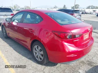 2015 Mazda 3 i Sport with VIN 3MZBM1U73FM156613, listed as a IAAI auction lot 42036090 with 104,296 mi miles and . Bid and sale history available at carsss.com. Image 3.