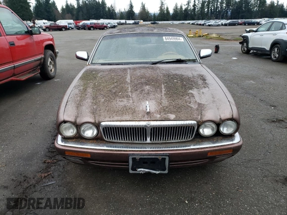 1995 Jaguar XJ with VIN SAJKX1742SC746763, listed as a Copart auction lot 84949964 with Not Provided miles and Clean Title. Bid and sale history available at DreamBid. Image 5.