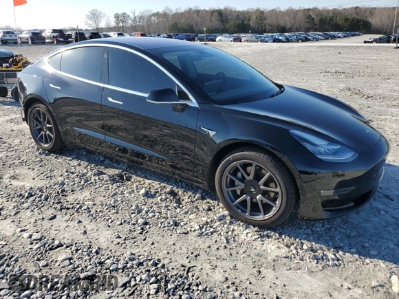 2019 Tesla Model 3 Mid Range with VIN 5YJ3E1EA3KF324201, listed as a Copart auction lot 43221185 with 117,606 mi miles and Salvage Title. Bid and sale history available at carsss.com. Image 4.