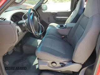 2002 Ford F-150 XL z VIN 1FTRF07202KB68581, wystawiony jako Copart lot #60276095 z przebiegiem 164 754 mil mil oraz Szkoda całkowita • Salvage title. Historia ofert i sprzedaży dostępna na DreamBid. Obrazek 7.