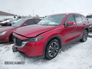 2022 Mazda CX-5 2.5 S Premium Package with VIN JM3KFBDM0N1628116, listed as a IAAI auction lot 41455990 with 29,911 mi miles. Bid and sale history available at carsss.com. Image 2.