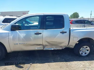 2007 Nissan Titan XE with VIN 1N6AA07AX7N231823, listed as a IAAI auction lot 42300587 with 210,735 mi miles and . Bid and sale history available at DreamBid. Image 14.