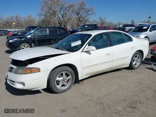 2002 Pontiac Bonneville SE with VIN 1G2HX54K724100247, listed as a IAAI auction lot 41952374 with 237,574 mi miles. Bid and sale history available at carsss.com. Image 2.