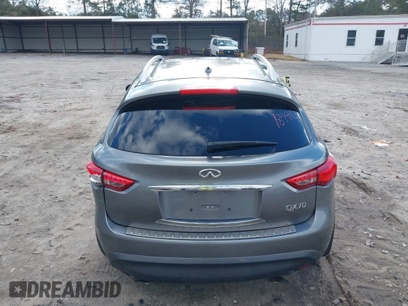2015 Infiniti QX70 with VIN JN8CS1MWXFM480906, listed as a IAAI auction lot 41177811 with 176,527 mi miles and . Bid and sale history available at DreamBid. Image 16.