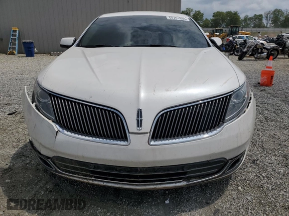 2013 Lincoln MKS with VIN 1LNHL9DK4DG612981, listed as a Copart auction lot 60701895 with 113,354 mi miles and Salvage title. Bid and sale history available at DreamBid. Image 5.