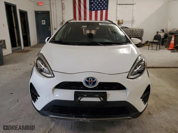 2018 Toyota Prius c One with VIN JTDKDTB36J1599682, listed as a Copart auction lot 52917125 with 76,264 mi miles and Clean Title. Bid and sale history available at carsss.com. Image 5.