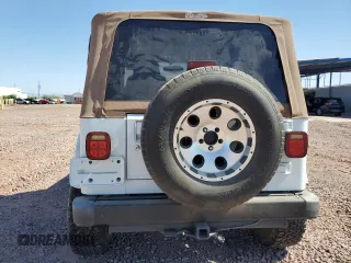 2003 Jeep Wrangler Sahara with VIN 1J4FA59S73P312279, listed as a Copart auction lot 60230445 with 151,886 mi miles and Clean title. Bid and sale history available at DreamBid. Image 6.