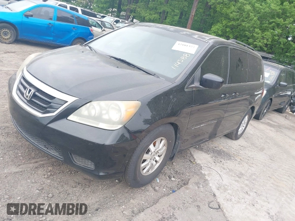2008 Honda Odyssey EX-L with VIN 5FNRL38758B114588, listed as a IAAI auction lot 42101377 with 306,345 mi miles and . Bid and sale history available at DreamBid. Image 2.