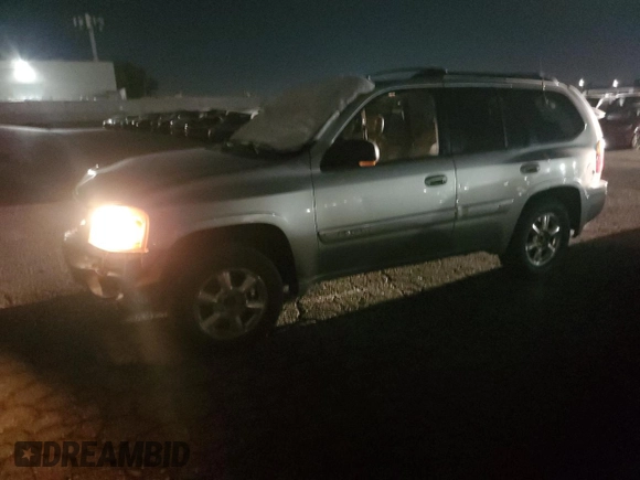 2002 GMC Envoy SLT with VIN 1GKDT13S522286497, listed as a Copart auction lot 84501384 with 207,226 mi miles and Salvage Title. Bid and sale history available at carsss.com. Image 1.