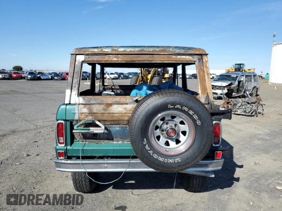 1975 Ford Bronco with VIN U15GLV42632, listed as a Copart auction lot 71173504 with Not provided miles and Salvage title. Bid and sale history available at DreamBid. Image 6.