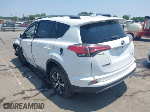 2018 Toyota RAV4 XLE z VIN 2T3WFREV1JW459553, wystawiony jako IAAI lot #42423474 z przebiegiem 129 523 mil mil oraz . Historia ofert i sprzedaży dostępna na DreamBid. Obrazek 3.