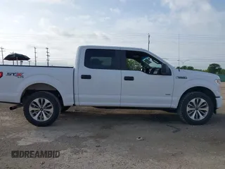 2017 Ford F-150 XL with VIN 1FTEW1EP8HKD07013, listed as a IAAI auction lot 42619279 with 103,750 mi miles and . Bid and sale history available at DreamBid. Image 13.