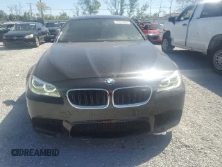 2014 BMW M5 z VIN WBSFV9C52ED593005, wystawiony jako Copart lot #49054395 z przebiegiem 71 213 mil mil oraz Szkoda całkowita • Salvage title. Historia ofert i sprzedaży dostępna na DreamBid. Obrazek 5.