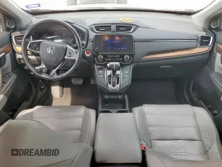 2020 Honda CR-V EX-L z VIN 2HKRW2H83LH674095, wystawiony jako Copart lot #57700135 z przebiegiem 90 826 mil mil oraz Czysty tytuł • Clean title. Historia ofert i sprzedaży dostępna na DreamBid. Obrazek 8.