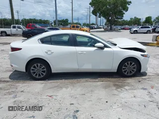 2021 Mazda 3 S z VIN 3MZBPAAL8MM254784, wystawiony jako IAAI lot #41936261 z przebiegiem 18 156 mil mil oraz . Historia ofert i sprzedaży dostępna na DreamBid. Obrazek 13.