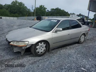 1998 Honda Accord LX with VIN 1HGCG5548WA156745, listed as a Copart auction lot 61944775 with 357,402 mi miles and Salvage title. Bid and sale history available at DreamBid. Image 1.