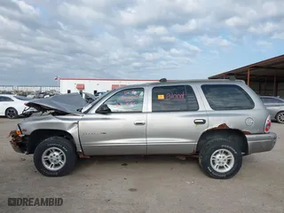 1999 Dodge Durango with VIN 1B4HS28Y9XF672873, listed as a IAAI auction lot 41919377 with 1 mi miles. Bid and sale history available at carsss.com. Image 14.