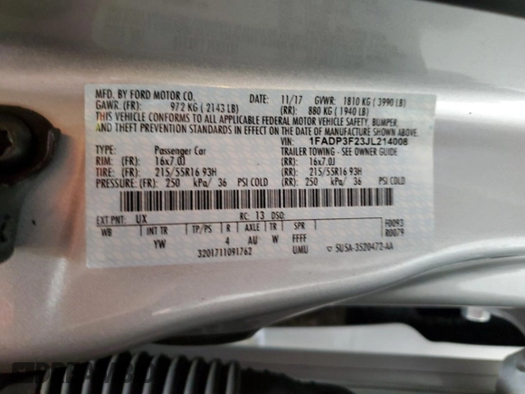 2018 Ford Focus SE with VIN 1FADP3F23JL214008, listed as a Copart auction lot 59692045 with 57,247 mi miles and Salvage title. Bid and sale history available at DreamBid. Image 12.