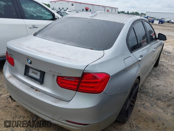 2014 BMW 3 Series 328i with VIN WBA3A5G52ENP31318, listed as a IAAI auction lot 42801411 with 149,355 mi miles and . Bid and sale history available at DreamBid. Image 4.