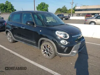 2014 FIAT 500L Trekking z VIN ZFBCFADH6EZ014198, wystawiony jako IAAI lot #42478129 z przebiegiem 99 639 mil mil oraz . Historia ofert i sprzedaży dostępna na DreamBid. Obrazek 1.