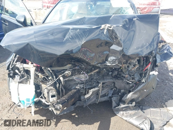2014 Lexus ES 300h with VIN JTHBW1GG5E2066621, listed as a IAAI auction lot 42008057 with Not Provided miles and . Bid and sale history available at DreamBid. Image 6.