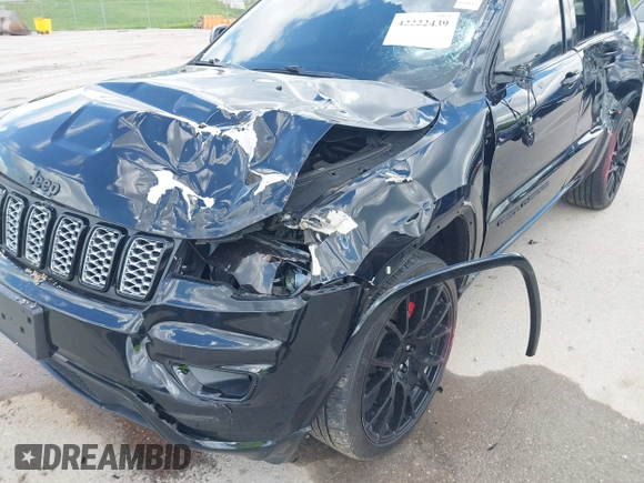2021 Jeep Grand Cherokee Laredo X with VIN 1C4RJFAG2MC516111, listed as a IAAI auction lot 42222439 with 60,888 mi miles and . Bid and sale history available at DreamBid. Image 6.