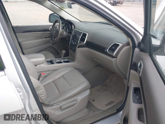 2011 Jeep Grand Cherokee Laredo with VIN 1J4RS4GGXBC564035, listed as a IAAI auction lot 41931861 with 242,291 mi miles and . Bid and sale history available at DreamBid. Image 5.