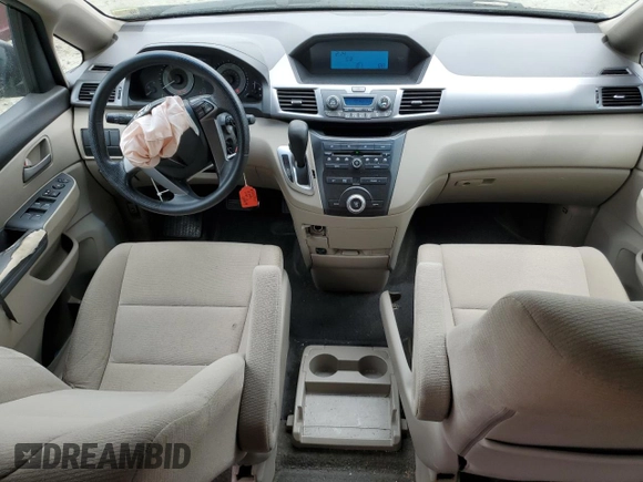 2011 Honda Odyssey LX z VIN 5FNRL5H29BB057920, wystawiony jako Copart lot #56433905 z przebiegiem 143 551 mil mil oraz Szkoda całkowita • Salvage title. Historia ofert i sprzedaży dostępna na DreamBid. Obrazek 8.