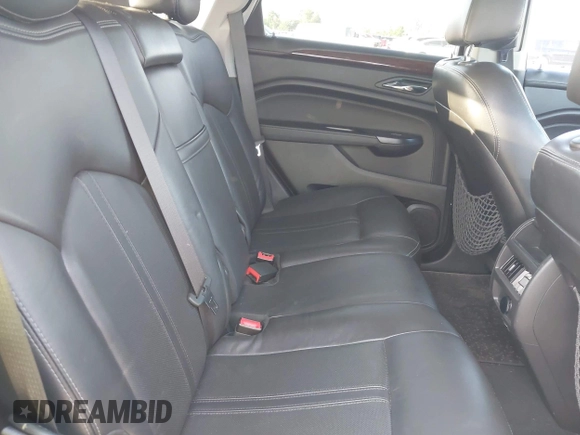 2016 Cadillac SRX Performance Collection with VIN 3GYFNCE33GS522781, listed as a IAAI auction lot 39875542 with 149,864 mi miles and . Bid and sale history available at DreamBid. Image 8.