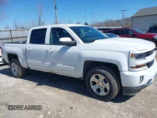 2017 Chevrolet Silverado 1500 LT with VIN 3GCUKREC3HG489701, listed as a IAAI auction lot 41814860 with 218,605 mi miles. Bid and sale history available at carsss.com. Image 13.