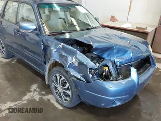 2007 Subaru Forester X with VIN JF1SG656X7H700288, listed as a IAAI auction lot 42384948 with 116,310 mi miles and . Bid and sale history available at DreamBid. Image 6.