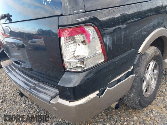 2003 Ford Expedition Eddie Bauer with VIN 1FMRU17W23LB73139, listed as a IAAI auction lot 41268690 with 238,299 mi miles. Bid and sale history available at carsss.com. Image 12.