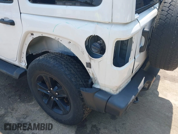 2021 Jeep Wrangler Unlimited Sahara with VIN 1C4HJXEN1MW618508, listed as a IAAI auction lot 42639515 with 39,747 mi miles and . Bid and sale history available at DreamBid. Image 17.