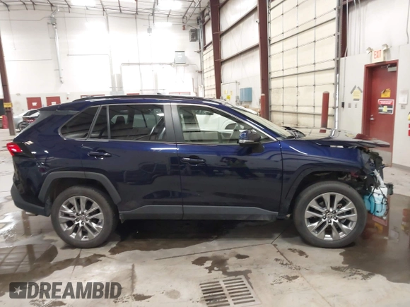2023 Toyota RAV4 XLE Premium with VIN JTMA1RFV7PD097029, listed as a IAAI auction lot 42509730 with 22,962 mi miles and . Bid and sale history available at DreamBid. Image 14.