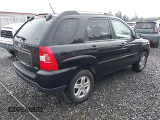 2010 Kia Sportage LX with VIN KNDKGCA33A7706645, listed as a IAAI auction lot 41387232 with 178,714 mi miles and . Bid and sale history available at carsss.com. Image 4.