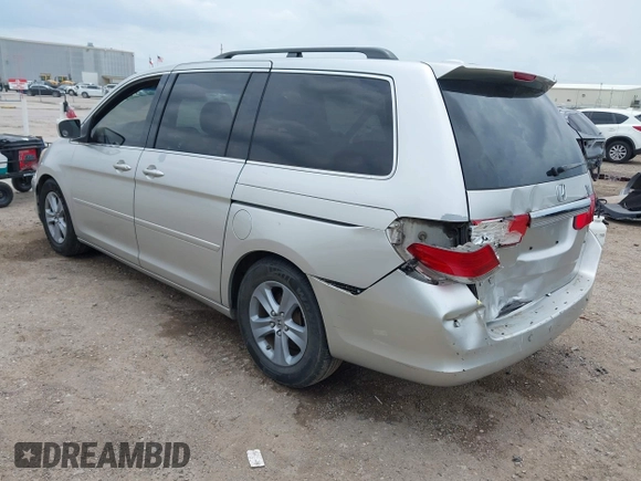 2009 Honda Odyssey Touring z VIN 5FNRL38979B052923, wystawiony jako IAAI lot #42427207 z przebiegiem 201 483 mil mil oraz . Historia ofert i sprzedaży dostępna na DreamBid. Obrazek 3.