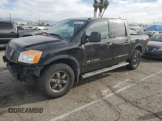 2013 Nissan Titan SL with VIN 1N6BA0EC9DN306161, listed as a Copart auction lot 50923005 with 199,141 mi miles and Salvage Title. Bid and sale history available at DreamBid. Image 1.