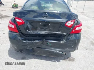 2016 Nissan Altima SR with VIN 1N4AL3AP7GC190466, listed as a IAAI auction lot 42126909 with 96,691 mi miles and . Bid and sale history available at DreamBid. Image 6.