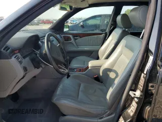 1998 Mercedes-Benz E-Class with VIN WDBJF65FXWA677383, listed as a Copart auction lot 65655114 with 110,333 mi miles and Clean Title. Bid and sale history available at carsss.com. Image 7.