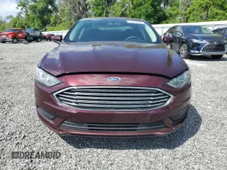2018 Ford Fusion SE with VIN 3FA6P0H7XJR127739, listed as a Copart auction lot 51217245 with 111,392 mi miles and Salvage Title. Bid and sale history available at DreamBid. Image 5.