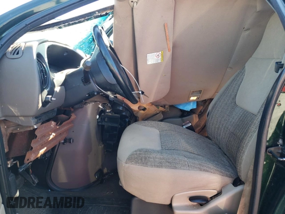 1999 Ford Econoline Passenger XL with VIN 1FBSS31L0XHB12679, listed as a Copart auction lot 74257504 with 136,821 mi miles and Salvage Title. Bid and sale history available at DreamBid. Image 7.