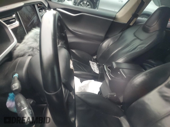 2013 Tesla Model S with VIN 5YJSA1AC9DFP10705, listed as a Copart auction lot 89394665 with Not Provided miles and Salvage Title. Bid and sale history available at carsss.com. Image 9.