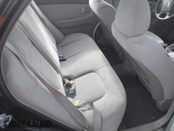 2007 Kia Spectra EX with VIN KNAFE122X75454914, listed as a IAAI auction lot 41711981 with 179,382 mi miles. Bid and sale history available at carsss.com. Image 8.